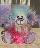 Pru is a beautiful, happy and gently colourful, one of a kind, hand dyed mohair little artist teddy bear by Barbara-Ann Bears she stands just under 5 inches/13 cm tall. Pru is made from several different mohairs that Barbara has dyed pink, lilac and blue together with a soft sky blue faux fur, velvet paw pads, hand painted eyes with eyelids, a beautifully embroidered nose and a sweet smile