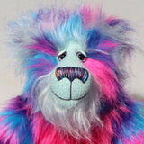 Agnes a huggable and colourful one of a kind artist bear in stunning blue, pink and purple faux fur and gorgeous fluffy turquoise mohair by Barbara-Ann Bears. 
Agnes stands 16 inches/40 cm tall