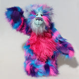 Agnes a huggable and colourful one of a kind artist bear in stunning blue, pink and purple faux fur and gorgeous fluffy turquoise mohair by Barbara-Ann Bears. 
Agnes stands 16 inches/40 cm tall