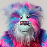 Agnes a huggable and colourful one of a kind artist bear in stunning blue, pink and purple faux fur and gorgeous fluffy turquoise mohair by Barbara-Ann Bears. 
Agnes stands 16 inches/40 cm tall