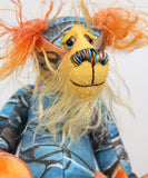 Ailsa Sunset is a beautifully coloured, sweet and slinky, one of a kind, artist bear in beautiful printed fabric and hand dyed mohair by Barbara-Ann Bears. She's a true artist bear, made from art. She stands just 8.5 inches/21 cm tall. She is made from a beautiful painting of Ailsa Craig with a hand dyed mohair face, ears and tail, hand dyed paws, hand painted eyes and a beautiful embroidered nose