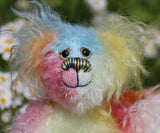 Bert is a very happy and colourful little teddy bear, a one of a kind, mohair artist bear by Barbara-Ann Bears, he stands just under 6 inches/15 cm tall.  Bert is made from many different colourful mohairs, hand painted eyes with hand coloured eyelids, a splendid nose embroidered from individual threads and he has a sweet, friendly smile.