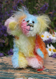 Bert is a very happy and colourful little teddy bear, a one of a kind, mohair artist bear by Barbara-Ann Bears, he stands just under 6 inches/15 cm tall.  Bert is made from many different colourful mohairs, hand painted eyes with hand coloured eyelids, a splendid nose embroidered from individual threads and he has a sweet, friendly smile.