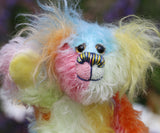 Bert is a very happy and colourful little teddy bear, a one of a kind, mohair artist bear by Barbara-Ann Bears, he stands just under 6 inches/15 cm tall.  Bert is made from many different colourful mohairs, hand painted eyes with hand coloured eyelids, a splendid nose embroidered from individual threads and he has a sweet, friendly smile.