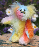 Bert is a very happy and colourful little teddy bear, a one of a kind, mohair artist bear by Barbara-Ann Bears, he stands just under 6 inches/15 cm tall.  Bert is made from many different colourful mohairs, hand painted eyes with hand coloured eyelids, a splendid nose embroidered from individual threads and he has a sweet, friendly smile.