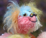 Bert is a very happy and colourful little teddy bear, a one of a kind, mohair artist bear by Barbara-Ann Bears, he stands just under 6 inches/15 cm tall.  Bert is made from many different colourful mohairs, hand painted eyes with hand coloured eyelids, a splendid nose embroidered from individual threads and he has a sweet, friendly smile.
