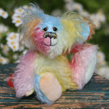 Bert is a very happy and colourful little teddy bear, a one of a kind, mohair artist bear by Barbara-Ann Bears, he stands just under 6 inches/15 cm tall.  Bert is made from many different colourful mohairs, hand painted eyes with hand coloured eyelids, a splendid nose embroidered from individual threads and he has a sweet, friendly smile.