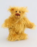 Billy McCubbin is a very sweet and happy little fluffy gold mohair artist bear by Barbara Ann Bears, he stands just 5.5 inches( 14 cm) tall and is 4.5 inches (11 cm) sitting. Billy is made from a a fluffy medium length gold mohair and his paw pads are made from the same mohair, trimmed down to the finest stubble.