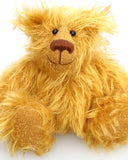 Billy McCubbin is a very sweet and happy little fluffy gold mohair artist bear by Barbara Ann Bears, he stands just 5.5 inches( 14 cm) tall and is 4.5 inches (11 cm) sitting. Billy is made from a a fluffy medium length gold mohair and his paw pads are made from the same mohair, trimmed down to the finest stubble.
