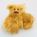 Billy McCubbin is a very sweet and happy little fluffy gold mohair artist bear by Barbara Ann Bears, he stands just 5.5 inches( 14 cm) tall and is 4.5 inches (11 cm) sitting. Billy is made from a a fluffy medium length gold mohair and his paw pads are made from the same mohair, trimmed down to the finest stubble.
