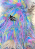 Celeste a huggable and colourful one of a kind artist bear in stunning faux fur and gorgeous fluffy mohair by Barbara-Ann Bears, she stands 18 inches/46 cm tall. Se is made from a long faux fur in blue, pink and yellow with, long fluffy white mohair, large hand painted eyes with eyelids, a splendid nose and a huge, beaming smile.