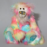 Celeste a sweet and colourful one of a kind artist bear in stunning faux fur and gorgeous fluffy mohair by Barbara-Ann Bears, she stands 15 inches/37 cm tall. she is made from a long faux fur in blue, pink, yellow, lime and lilac with, long fluffy white mohair, large hand painted eyes with eyelids, a splendid nose and a huge, beaming smile.
