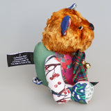 Chuffy Jingles is a very happy and friendly, one of a kind, artist teddy bear made from beautiful Christmassy fabric and vintage copper crushed velvet by Barbara Ann Bears,  he is 8 inches/20 cm tall. Chuffy Jingles is made from 10 pieces of different printed cotton Christmas fabrics and vintage, copper crushed velvet. Chuffy Jingles has beautiful hand painted eyes, a splendid carefully embroidered little nose and a very cheerful and hopeful expression