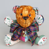 Chuffy Jingles is a very happy and friendly, one of a kind, artist teddy bear made from beautiful Christmassy fabric and vintage copper crushed velvet by Barbara Ann Bears,  he is 8 inches/20 cm tall. Chuffy Jingles is made from 10 pieces of different printed cotton Christmas fabrics and vintage, copper crushed velvet. Chuffy Jingles has beautiful hand painted eyes, a splendid carefully embroidered little nose and a very cheerful and hopeful expression