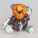 Chuffy Jingles is a very happy and friendly, one of a kind, artist teddy bear made from beautiful Christmassy fabric and vintage copper crushed velvet by Barbara Ann Bears,  he is 8 inches/20 cm tall. Chuffy Jingles is made from 10 pieces of different printed cotton Christmas fabrics and vintage, copper crushed velvet. Chuffy Jingles has beautiful hand painted eyes, a splendid carefully embroidered little nose and a very cheerful and hopeful expression