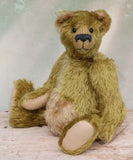 Dimpty Dimwit is sweet and happy bear, a veteran mohair artist bear from Barbara-Ann Bears, he stands 14 inches/36 cm tall. Dimpty Dimwit is made in khaki coloured straight mohair, with a beige mohair tummy and a proper belly button. He has pale beige wool felt paw pads, vintage boot button eyes and a charcoal wool nose