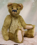 Dimpty Dimwit is sweet and happy bear, a veteran mohair artist bear from Barbara-Ann Bears, he stands 14 inches/36 cm tall. Dimpty Dimwit is made in khaki coloured straight mohair, with a beige mohair tummy and a proper belly button. He has pale beige wool felt paw pads, vintage boot button eyes and a charcoal wool nose