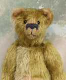 Dimpty Dimwit is sweet and happy bear, a veteran mohair artist bear from Barbara-Ann Bears, he stands 14 inches/36 cm tall. Dimpty Dimwit is made in khaki coloured straight mohair, with a beige mohair tummy and a proper belly button. He has pale beige wool felt paw pads, vintage boot button eyes and a charcoal wool nose