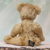 Douglas is a very sweet and friendly mohair artist teddy bear by Barbara Ann Bears, stands 11 inches/28 cm tall and is 8 inches/20 cm sitting. Douglas is a wonderful vintage traditional teddy bear we made in the early 1990s from antique gold German mohair, with felt paw pads and green glass eyes