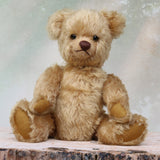 Douglas is a very sweet and friendly mohair artist teddy bear by Barbara Ann Bears, stands 11 inches/28 cm tall and is 8 inches/20 cm sitting. Douglas is a wonderful vintage traditional teddy bear we made in the early 1990s from antique gold German mohair, with felt paw pads and green glass eyes