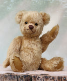 Douglas is a very sweet and friendly mohair artist teddy bear by Barbara Ann Bears, stands 11 inches/28 cm tall and is 8 inches/20 cm sitting. Douglas is a wonderful vintage traditional teddy bear we made in the early 1990s from antique gold German mohair, with felt paw pads and green glass eyes