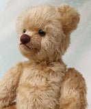 Douglas is a very sweet and friendly mohair artist teddy bear by Barbara Ann Bears, stands 11 inches/28 cm tall and is 8 inches/20 cm sitting. Douglas is a wonderful vintage traditional teddy bear we made in the early 1990s from antique gold German mohair, with felt paw pads and green glass eyes