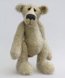 Howard is a charming and very friendly, one of a kind mohair artist bear by Barbara-Ann Bears, he stands 13.5 inches/41cm tall and is 10inches/25cm sitting. Howard is made from a medium length, sparse silvery grey mohair, with grey wool felt paw pads, hand painted glass eyes with hand coloured eyelids and a splendid nose embroidered from charcoal coloured wool
