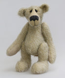 Howard is a charming and very friendly, one of a kind mohair artist bear by Barbara-Ann Bears, he stands 13.5 inches/41cm tall and is 10inches/25cm sitting. Howard is made from a medium length, sparse silvery grey mohair, with grey wool felt paw pads, hand painted glass eyes with hand coloured eyelids and a splendid nose embroidered from charcoal coloured wool