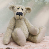 Howard is a charming and very friendly, one of a kind mohair artist bear by Barbara-Ann Bears, he stands 13.5 inches/41cm tall and is 10inches/25cm sitting. Howard is made from a medium length, sparse silvery grey mohair, with grey wool felt paw pads, hand painted glass eyes with hand coloured eyelids and a splendid nose embroidered from charcoal coloured wool