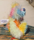 Ernie is a very happy and colourful little teddy bear, a one of a kind, mohair artist bear by Barbara-Ann Bears, he stands just under 6 inches/15 cm tall.  Ernie is made from many different colourful mohairs, hand painted eyes with hand coloured eyelids, a splendid nose embroidered from individual threads and he has a sweet, friendly smile.