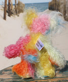 Ernie is a very happy and colourful little teddy bear, a one of a kind, mohair artist bear by Barbara-Ann Bears, he stands just under 6 inches/15 cm tall.  Ernie is made from many different colourful mohairs, hand painted eyes with hand coloured eyelids, a splendid nose embroidered from individual threads and he has a sweet, friendly smile.