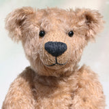 Foggy is a sweet vintage limited edition mohair artist bear from Barbara-Ann Bears he stands 14 inches/35cm tall.
Foggy dates from the mid 1990s and is number 4 of 4 from an edition we made for Collectif teddy bear shop near Southampton