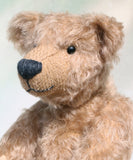 Foggy is a sweet vintage limited edition mohair artist bear from Barbara-Ann Bears he stands 14 inches/35cm tall.
Foggy dates from the mid 1990s and is number 4 of 4 from an edition we made for Collectif teddy bear shop near Southampton