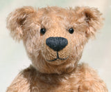 Foggy is a sweet vintage limited edition mohair artist bear from Barbara-Ann Bears he stands 14 inches/35cm tall.
Foggy dates from the mid 1990s and is number 4 of 4 from an edition we made for Collectif teddy bear shop near Southampton