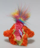 Harry Tickle is a very happy and colourful little one of a kind, hand dyed mohair and faux fur artist bear by Barbara-Ann Bears, he stands 6.5 inches/16 cm tall. Harry Tickle is made from hand dyed mohair, with long plumes of faux fur on his head, hand painted eyes, a multicoloured nose and a beaming smile a happy bear!