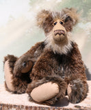 Jefferson Spruce is a very shaggy, wild and wonderful, one of a kind, artist teddy bear in beautiful Tissavel faux fur & fluffy mohair by Barbara-Ann Bears, he stands 19.5 inches/50 cm tall. Jefferson Spruce is made from brown faux fur and very long and fluffy beige mohair, with beige wool felt paws, hand painted eyes and eyelids, a wonderful nose and sweet soulful smile