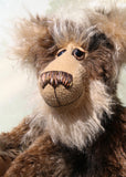 Jefferson Spruce is a very shaggy, wild and wonderful, one of a kind, artist teddy bear in beautiful Tissavel faux fur & fluffy mohair by Barbara-Ann Bears, he stands 19.5 inches/50 cm tall. Jefferson Spruce is made from brown faux fur and very long and fluffy beige mohair, with beige wool felt paws, hand painted eyes and eyelids, a wonderful nose and sweet soulful smile