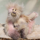 Jerry is a very sweet and gentle one of a kind, artist bear by Barbara-Ann Bears in gorgeous mohair and beautifully coloured pastel faux fur, he stands 14 inches/36 cm tall. He is made from a pale pink and cream faux fur with long cream mohair, cream wool felt paw pads, hand painted eyes, a beautifully embroidered nose and a cheerful smile.