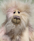 Jerry has beautifully hand painted glass eyes with eyelids and a wonderfully embroidered nose, sewn from individual threads to match his colouring. He has a thoughtful expression and a huge beaming smile