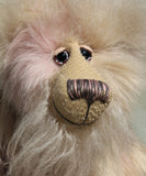 Jerry has beautifully hand painted glass eyes with eyelids and a wonderfully embroidered nose, sewn from individual threads to match his colouring. He has a thoughtful expression and a huge beaming smile