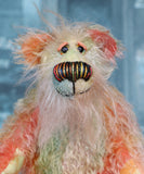 Keith is a very happy and colourful little one of a kind, hand dyed mohair artist bear by Barbara-Ann Bears, he stands 6 inches/15 cm tall.
Keith is made from hand dyed mohair, with hand dyed velvet paws, hand painted eyes and eyelids and a striking nose and sweet smile
