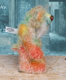 Keith is a very happy and colourful little one of a kind, hand dyed mohair artist bear by Barbara-Ann Bears, he stands 6 inches/15 cm tall.
Keith is made from hand dyed mohair, with hand dyed velvet paws, hand painted eyes and eyelids and a striking nose and sweet smile