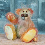 Keith is a very happy and colourful little one of a kind, hand dyed mohair artist bear by Barbara-Ann Bears, he stands 6 inches/15 cm tall.
Keith is made from hand dyed mohair, with hand dyed velvet paws, hand painted eyes and eyelids and a striking nose and sweet smile