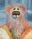 Keith is a very happy and colourful little one of a kind, hand dyed mohair artist bear by Barbara-Ann Bears, he stands 6 inches/15 cm tall.
Keith is made from hand dyed mohair, with hand dyed velvet paws, hand painted eyes and eyelids and a striking nose and sweet smile