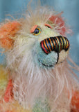 Keith is a very happy and colourful little one of a kind, hand dyed mohair artist bear by Barbara-Ann Bears, he stands 6 inches/15 cm tall.
Keith is made from hand dyed mohair, with hand dyed velvet paws, hand painted eyes and eyelids and a striking nose and sweet smile