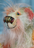 Keith is a very happy and colourful little one of a kind, hand dyed mohair artist bear by Barbara-Ann Bears, he stands 6 inches/15 cm tall.
Keith is made from hand dyed mohair, with hand dyed velvet paws, hand painted eyes and eyelids and a striking nose and sweet smile