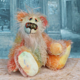Keith is a very happy and colourful little one of a kind, hand dyed mohair artist bear by Barbara-Ann Bears, he stands 6 inches/15 cm tall.
Keith is made from hand dyed mohair, with hand dyed velvet paws, hand painted eyes and eyelids and a striking nose and sweet smile