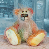 Keith is a very happy and colourful little one of a kind, hand dyed mohair artist bear by Barbara-Ann Bears, he stands 6 inches/15 cm tall.
Keith is made from hand dyed mohair, with hand dyed velvet paws, hand painted eyes and eyelids and a striking nose and sweet smile