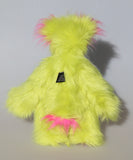 Leonardo is a flamboyant, fun-loving and comical, one of a kind, artist bear by Barbara-Ann Bears in luxurious mohair and rather wild lime faux fur, he stands 12 inches/30 cm tall Leonardo is made from lime faux fur, with a very long faux fur in pink, greyish blue and gold, a bright cerise faux fur and long and fluffy white mohair.His paws are cerise wool felt.  Leonardo has beautiful hand painted glass eyes with eyelids, a wonderfully embroidered nose and he has a huge beaming smile.