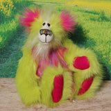 Leonardo is a flamboyant, fun-loving and comical, one of a kind, artist bear by Barbara-Ann Bears in luxurious mohair and rather wild lime faux fur, he stands 12 inches/30 cm tall Leonardo is made from lime faux fur, with a very long faux fur in pink, greyish blue and gold, a bright cerise faux fur and long and fluffy white mohair.His paws are cerise wool felt.  Leonardo has beautiful hand painted glass eyes with eyelids, a wonderfully embroidered nose and he has a huge beaming smile.